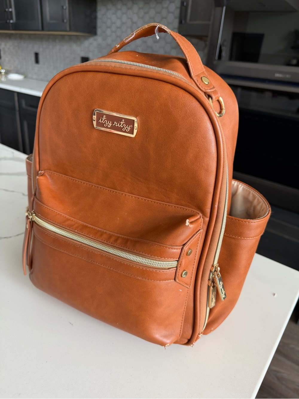 Itzy Ritzy Tan Leather Backpack – Men’s Everyday Bag